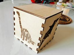 Wooden decorative box with laser-cut dinosaur design / boite dinosaure